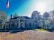 Stately home featuring a symmetrical facade, columned entryway, and expansive front lawn at 370 Buchanan Circle Tract 1, Dallas, GA 30157