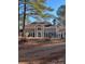Beautiful traditional home with prominent columns, arched windows, and well-manicured landscaping at 370 Buchanan Circle Tract 1, Dallas, GA 30157