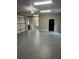 Spacious garage with sealed floors, ample lighting, and an automatic garage door opener at 370 Buchanan Circle Tract 1, Dallas, GA 30157