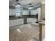 Modern kitchen with white cabinets, stainless steel appliances, granite countertops, and an island with seating at 370 Buchanan Circle Tract 1, Dallas, GA 30157