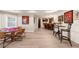 Open basement with bar, game room, and sports memorabilia, ideal for relaxation or entertainment at 7390 Canter Run, Cumming, GA 30040