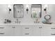 Bright bathroom vanity with dual sinks, framed mirrors, and modern light fixtures at 7390 Canter Run, Cumming, GA 30040