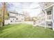 Open backyard featuring well-kept lawn, fence and a deck at 1195 Cameron Ne Ct, Atlanta, GA 30306
