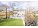 Spacious backyard featuring a well-kept lawn, deck, and fence at 1195 Cameron Ne Ct, Atlanta, GA 30306