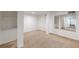 Open basement featuring carpeted floors and large mirror for a functional, spacious feel at 1195 Cameron Ne Ct, Atlanta, GA 30306