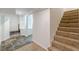 Basement with tiled and carpeted areas, stairs to upper level, and storage space at 1195 Cameron Ne Ct, Atlanta, GA 30306