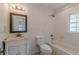 Bathroom featuring vanity and subway tile in the shower and bath at 1195 Cameron Ne Ct, Atlanta, GA 30306