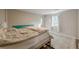 Bright bedroom features a large window, light walls, and hardwood floors at 1195 Cameron Ne Ct, Atlanta, GA 30306