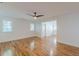 Spacious bedroom featuring hardwood flooring, neutral paint, and a modern ceiling fan at 1195 Cameron Ne Ct, Atlanta, GA 30306