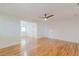 Bright bedroom with hardwood floors, white trim, neutral paint, and a ceiling fan at 1195 Cameron Ne Ct, Atlanta, GA 30306