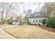 A beautiful home with a well-maintained lawn and mature trees at 1195 Cameron Ne Ct, Atlanta, GA 30306