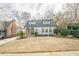 Charming two-story home with stone archway and dormer windows at 1195 Cameron Ne Ct, Atlanta, GA 30306