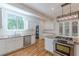 Modern kitchen with stainless steel appliances, granite countertops and island at 1195 Cameron Ne Ct, Atlanta, GA 30306