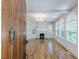 Bright living room featuring hardwood floors, fireplace, and ample natural light at 1195 Cameron Ne Ct, Atlanta, GA 30306
