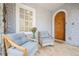 Charming porch with comfortable seating, stone flooring, and a lovely view at 1195 Cameron Ne Ct, Atlanta, GA 30306