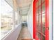 Inviting sunroom with large windows, tiled floors, and plenty of natural light at 1195 Cameron Ne Ct, Atlanta, GA 30306