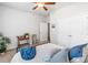 Neutral bedroom featuring a ceiling fan and cozy furnishings at 155 Point View Dr, Canton, GA 30114