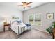 Bedroom with neutral carpet, ceiling fan, and natural light at 155 Point View Dr, Canton, GA 30114