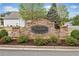 Stone entrance sign for 'The Villages at River Pointe' surrounded by lush landscaping at 155 Point View Dr, Canton, GA 30114