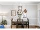Dining room area featuring modern decor and a stylish table set for four, perfect for Gathering meals at 155 Point View Dr, Canton, GA 30114