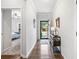 Bright entryway with hardwood floors, neutral walls, and a view into the bedroom at 155 Point View Dr, Canton, GA 30114
