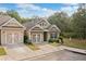 Charming home with well-manicured lawn and a two car garage at 155 Point View Dr, Canton, GA 30114