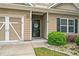 Close-up view of the home's front entrance with a decorative 'Welcome' wreath on the door at 155 Point View Dr, Canton, GA 30114