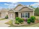 Charming single-story home featuring a landscaped front yard and attached garage at 155 Point View Dr, Canton, GA 30114