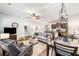 A spacious and modern living space with an open layout, seamlessly connecting the living room, dining area, and kitchen at 155 Point View Dr, Canton, GA 30114