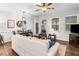 Bright open living area with connected dining, offers seamless flow, and abundant natural light at 155 Point View Dr, Canton, GA 30114