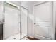 Clean, modern shower with a glass door and white tiled walls at 155 Point View Dr, Canton, GA 30114