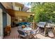 Cozy back deck area with a pergola, seating, BBQ grill, and an outdoor heater at 342 5Th Ne St, Atlanta, GA 30308