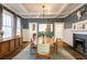 Beautiful dining room features patterned wallpaper, coffered ceiling, and sleek modern lighting at 342 5Th Ne St, Atlanta, GA 30308
