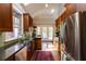 Updated kitchen boasts stainless steel appliances, granite countertops and abundant storage space, with doors to outdoor area at 342 5Th Ne St, Atlanta, GA 30308