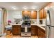 Cozy kitchen with stainless steel appliances, white countertops, and ample cabinet space at 342 5Th Ne St, Atlanta, GA 30308