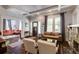 Inviting living room boasts a stone fireplace, coffered ceilings, and beautiful hardwood floors at 342 5Th Ne St, Atlanta, GA 30308