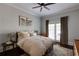 Relaxing main bedroom retreat with a ceiling fan and access to a private outdoor balcony at 342 5Th Ne St, Atlanta, GA 30308
