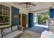 Inviting front porch with comfortable seating, string lights, ceiling fan, and stylish decor at 342 5Th Ne St, Atlanta, GA 30308