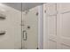 Glass enclosed shower with white subway tile, white grout, and a shower door at 342 5Th Ne St, Atlanta, GA 30308
