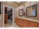 Bathroom with double sinks, granite counters and walk-in closet, offering plenty of storage space at 3590 Fricks Rd, Marietta, GA 30062