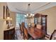 Formal dining room with a large table, chandelier, and elegant furnishings at 3590 Fricks Rd, Marietta, GA 30062