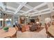 Spacious living room showcasing fireplace, coffered ceiling, and comfortable seating arrangement at 3590 Fricks Rd, Marietta, GA 30062