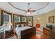 Comfortable main bedroom with ensuite bathroom access and beautiful windows at 3590 Fricks Rd, Marietta, GA 30062
