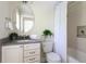 Bathroom with a single vanity, toilet, and combined shower and tub at 1440 Hillpine Ln, Atlanta, GA 30306