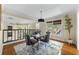 Chic dining area with modern chandelier and views of the main living space at 1440 Hillpine Ln, Atlanta, GA 30306