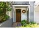 Inviting front entrance with a craftsman style door and decorative wreath at 1440 Hillpine Ln, Atlanta, GA 30306