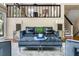 Elegant living room with modern furniture and second-floor balcony view at 1440 Hillpine Ln, Atlanta, GA 30306