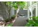 Inviting patio with comfortable seating, lush greenery, and privacy fence at 1440 Hillpine Ln, Atlanta, GA 30306