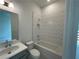 Bathroom with a soaking tub, a separate shower, and modern tile work at 1994 Freestone Way, Marietta, GA 30064