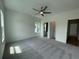 Spacious bedroom with natural light, neutral walls, and ensuite bathroom access at 1994 Freestone Way, Marietta, GA 30064